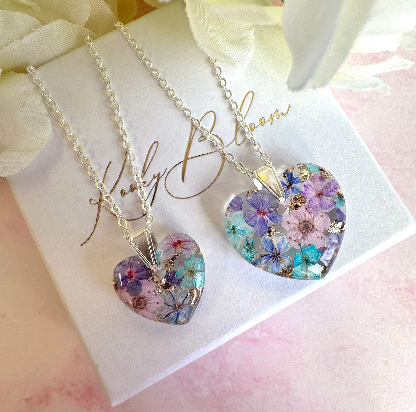 Silver Maxi Violet meadow heart necklace.