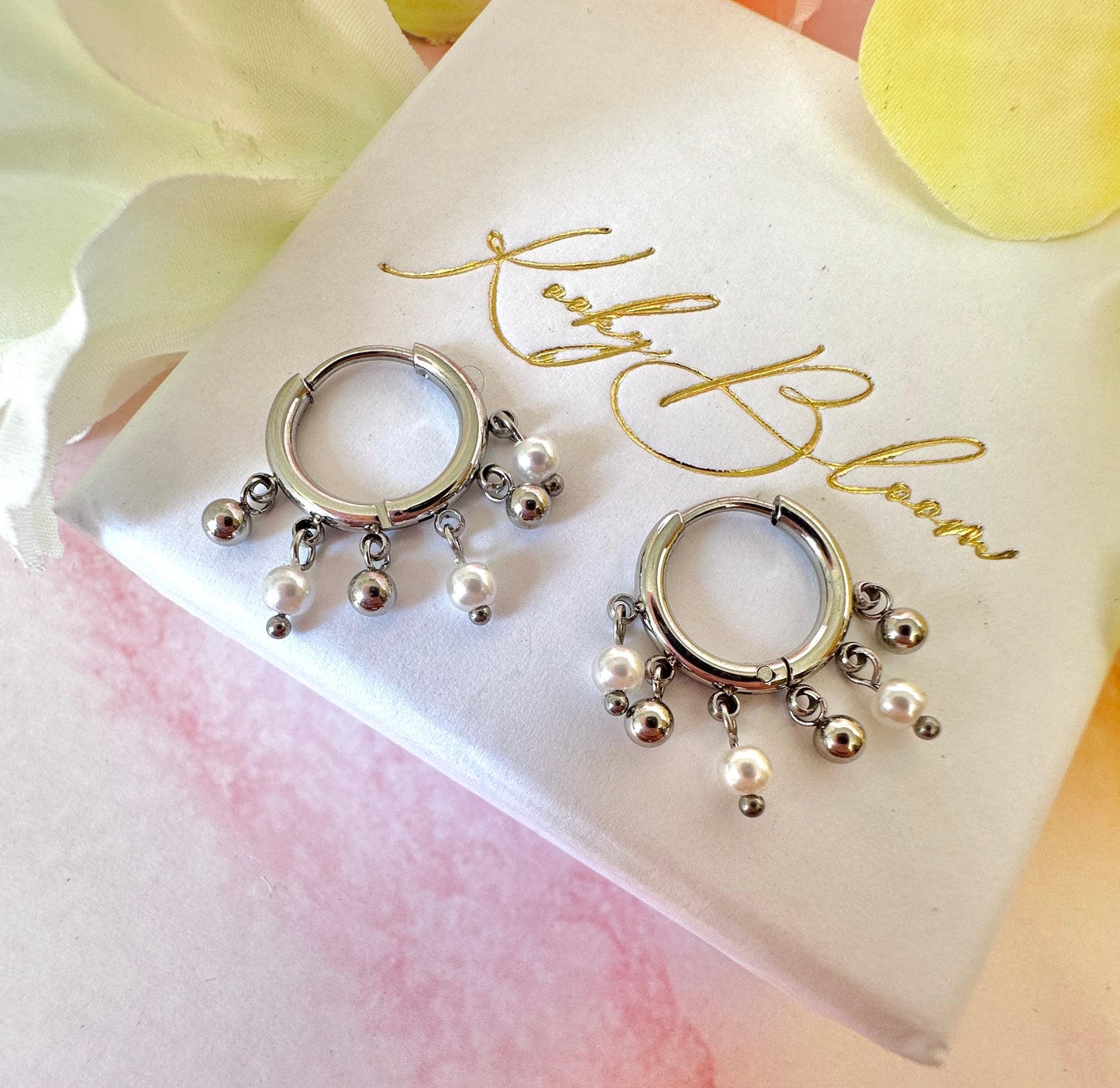 Silver Pearl chandelier huggie hoop earrings.