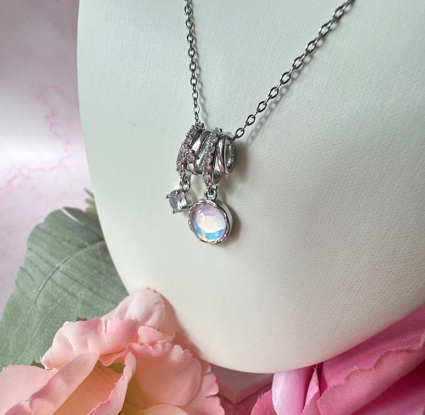 Silver Opalescent Cz Cluster charm necklace.