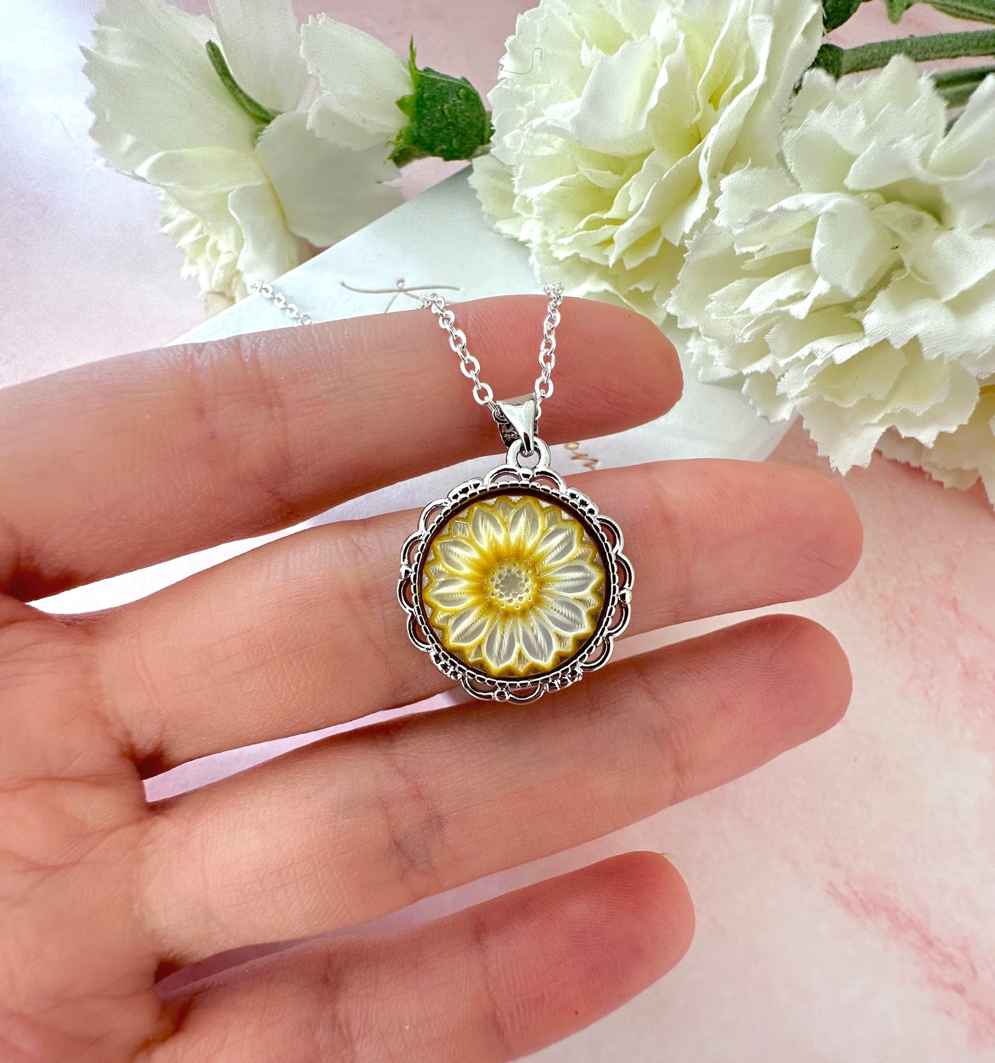 Silver carved Flower necklace.
