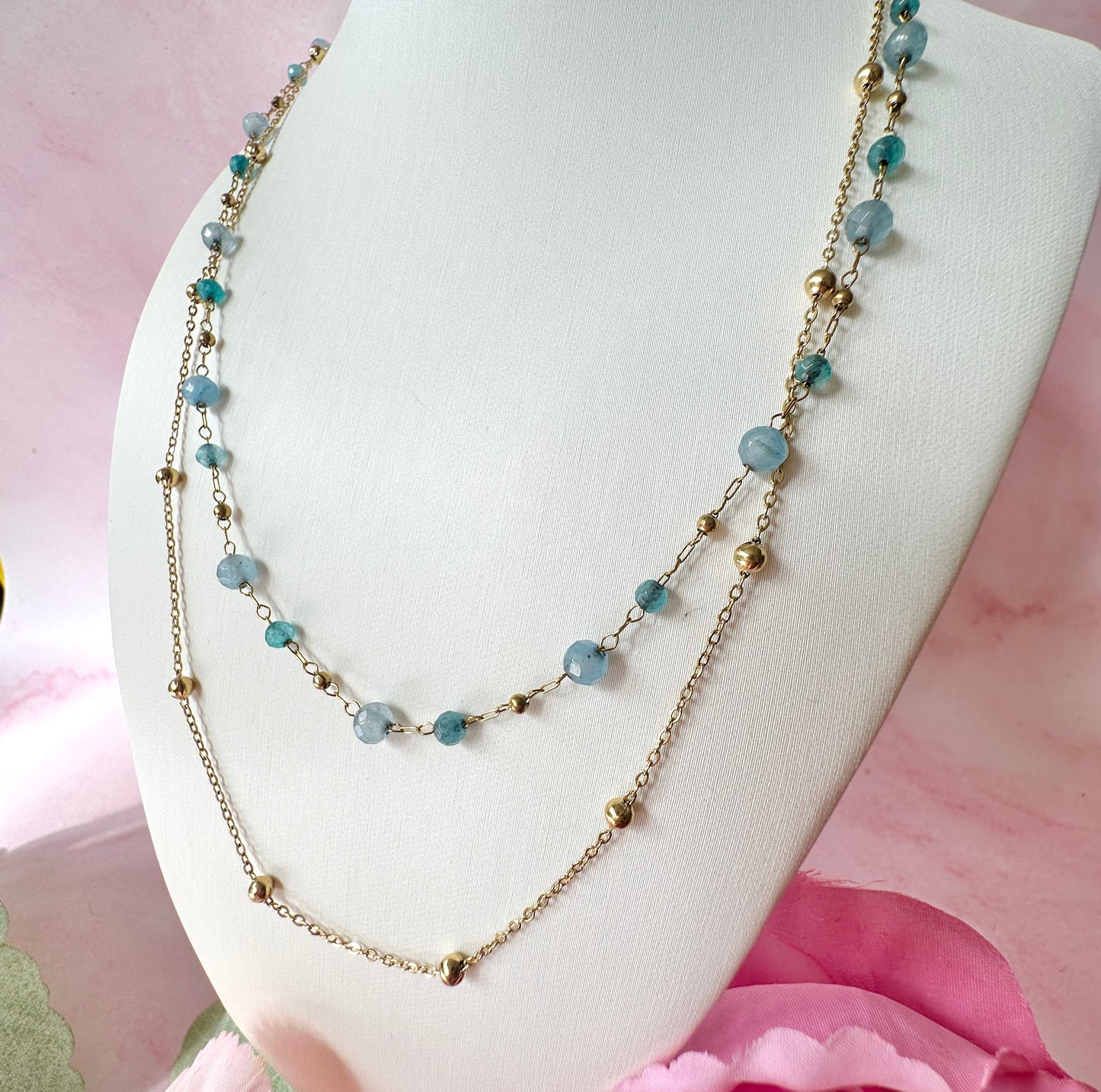 Gold layered blue bead necklace.