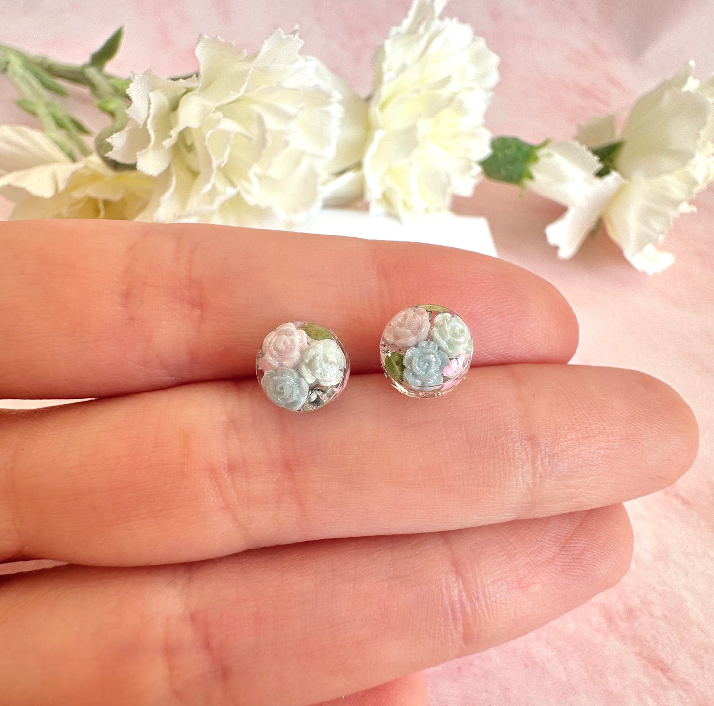 Tiny Flower filled Sterling silver stud earrings.