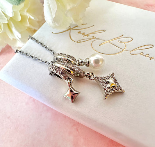 Silver diamond pearl loop Charm necklace.