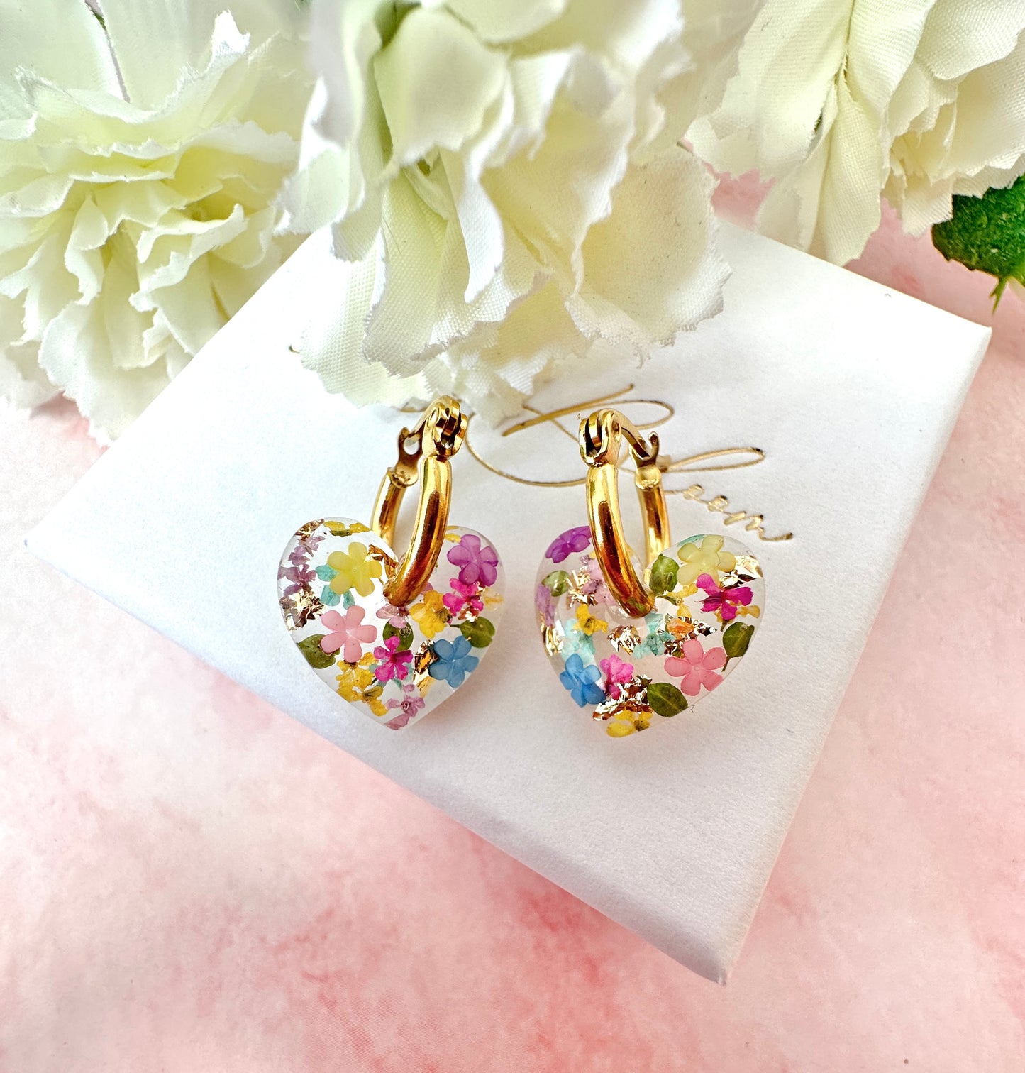 Rainbow Burst bloom heart hoop earrings.