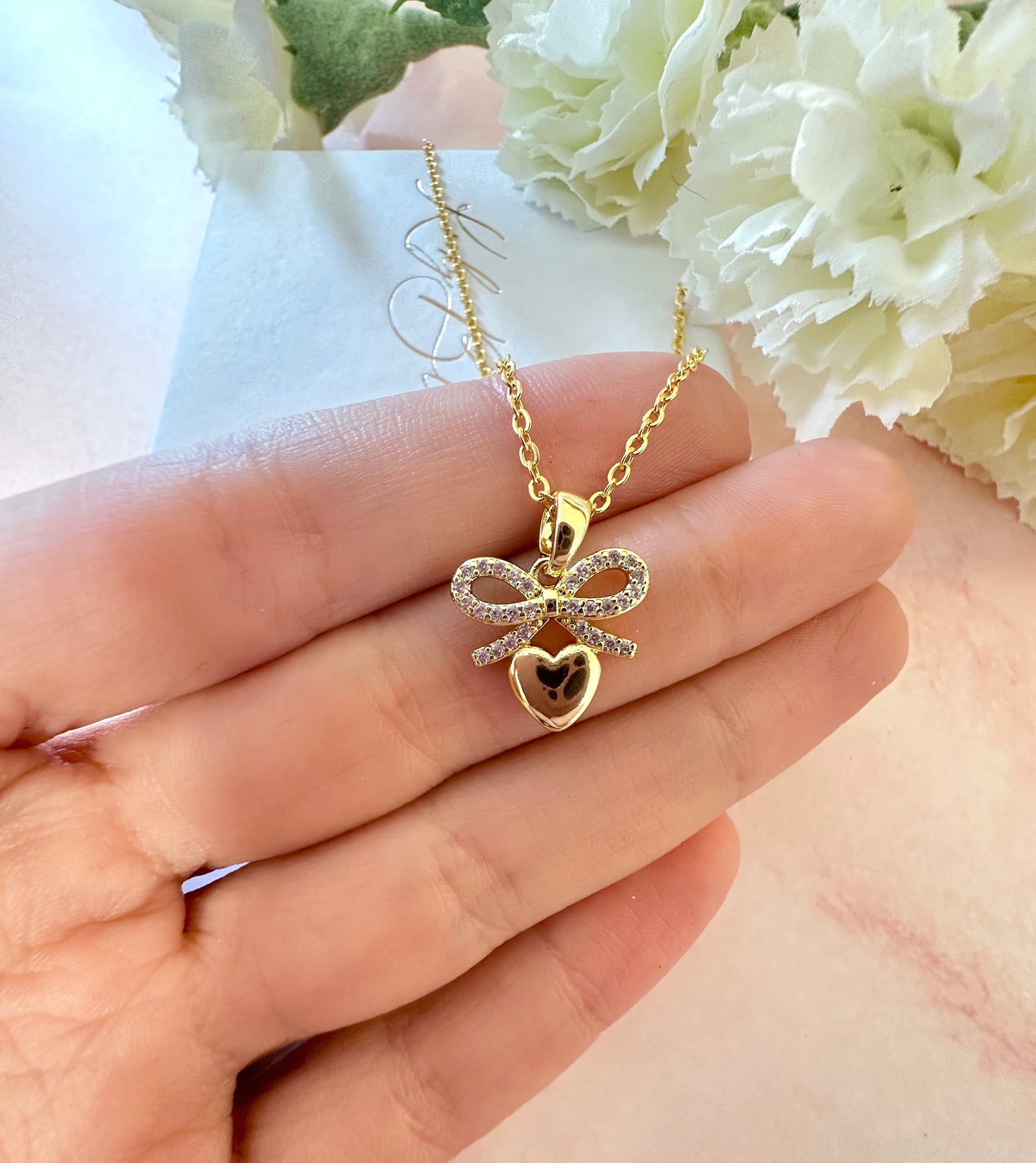 Gold Bow heart Necklace.