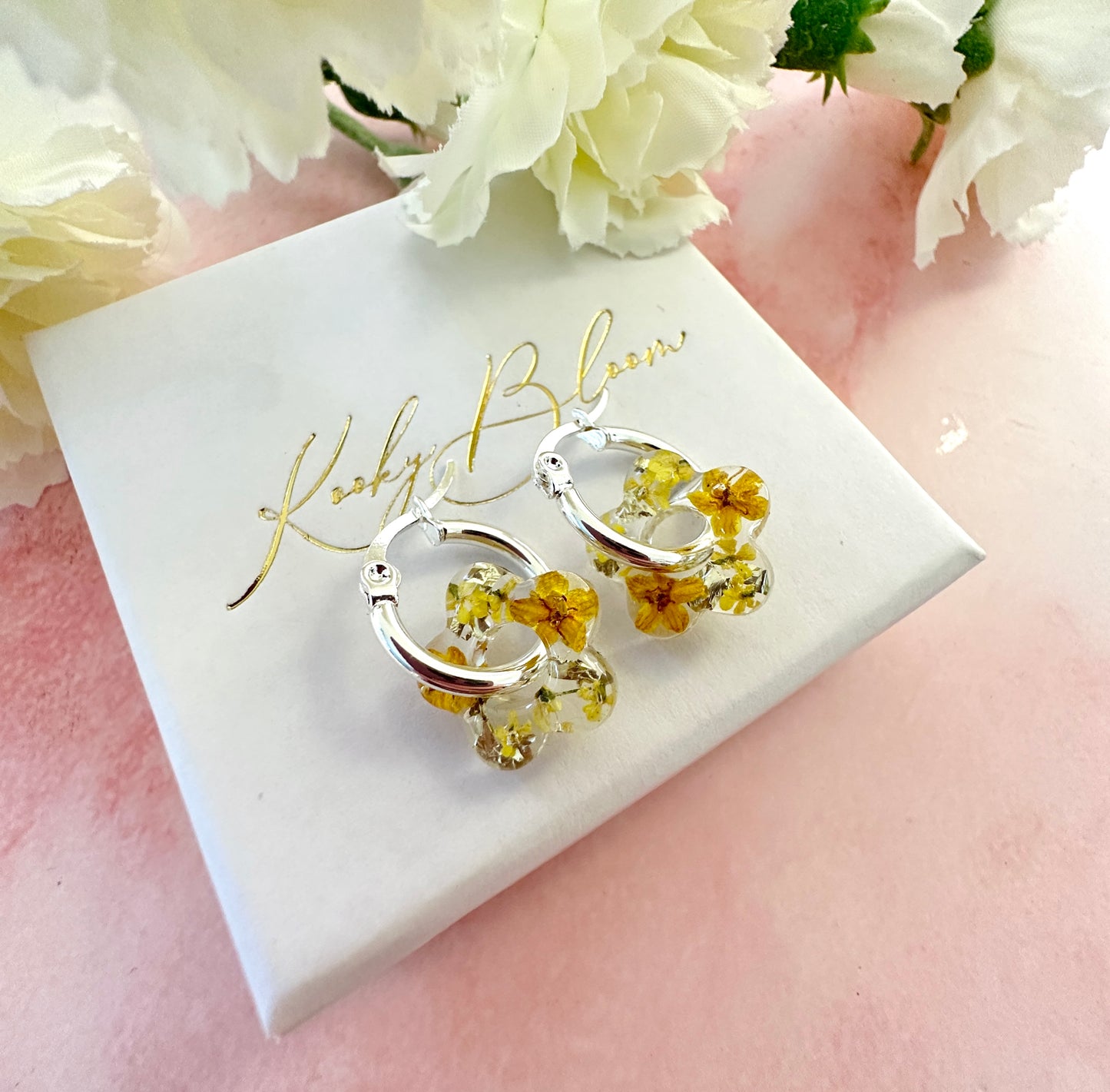 Tiny Yellow bloom flower earrings.