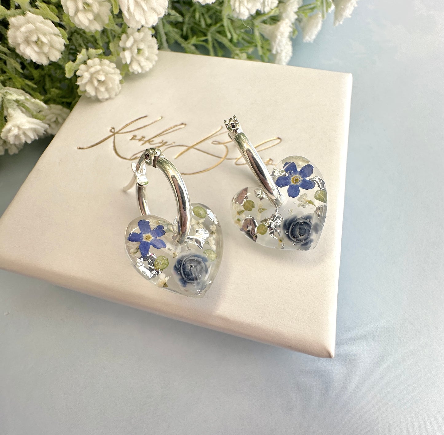 Mini Powder Blue Forget me not heart hoop earrings.