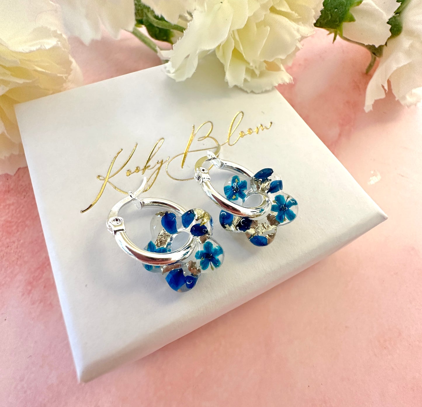 Tiny Blue bloom flower earrings.