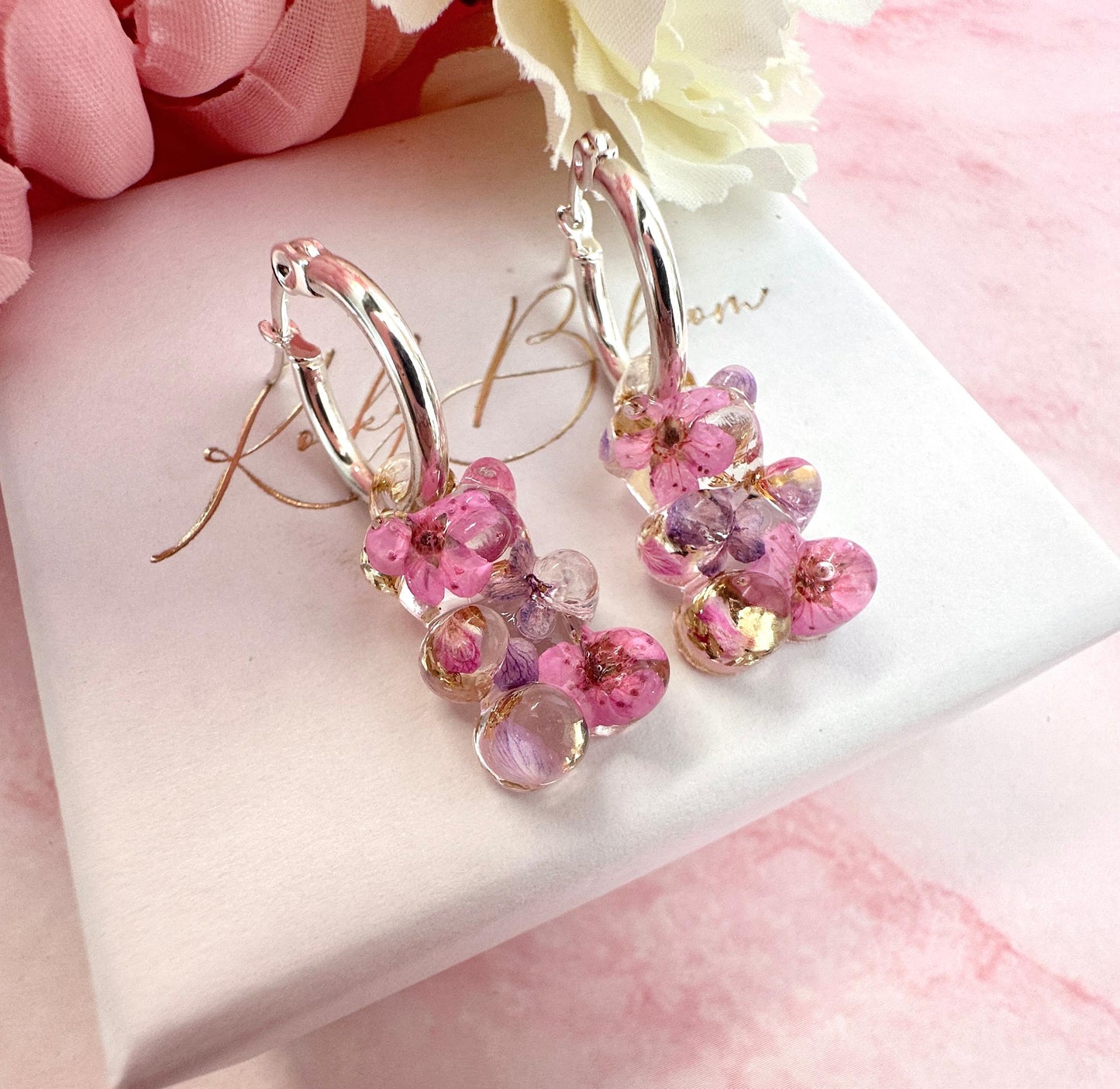 Gummy Bloom Bear hoop earrings.