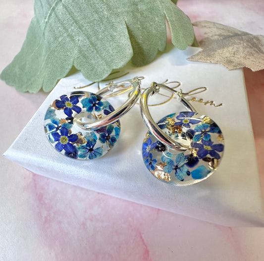 Denim Donut bloom earrings.