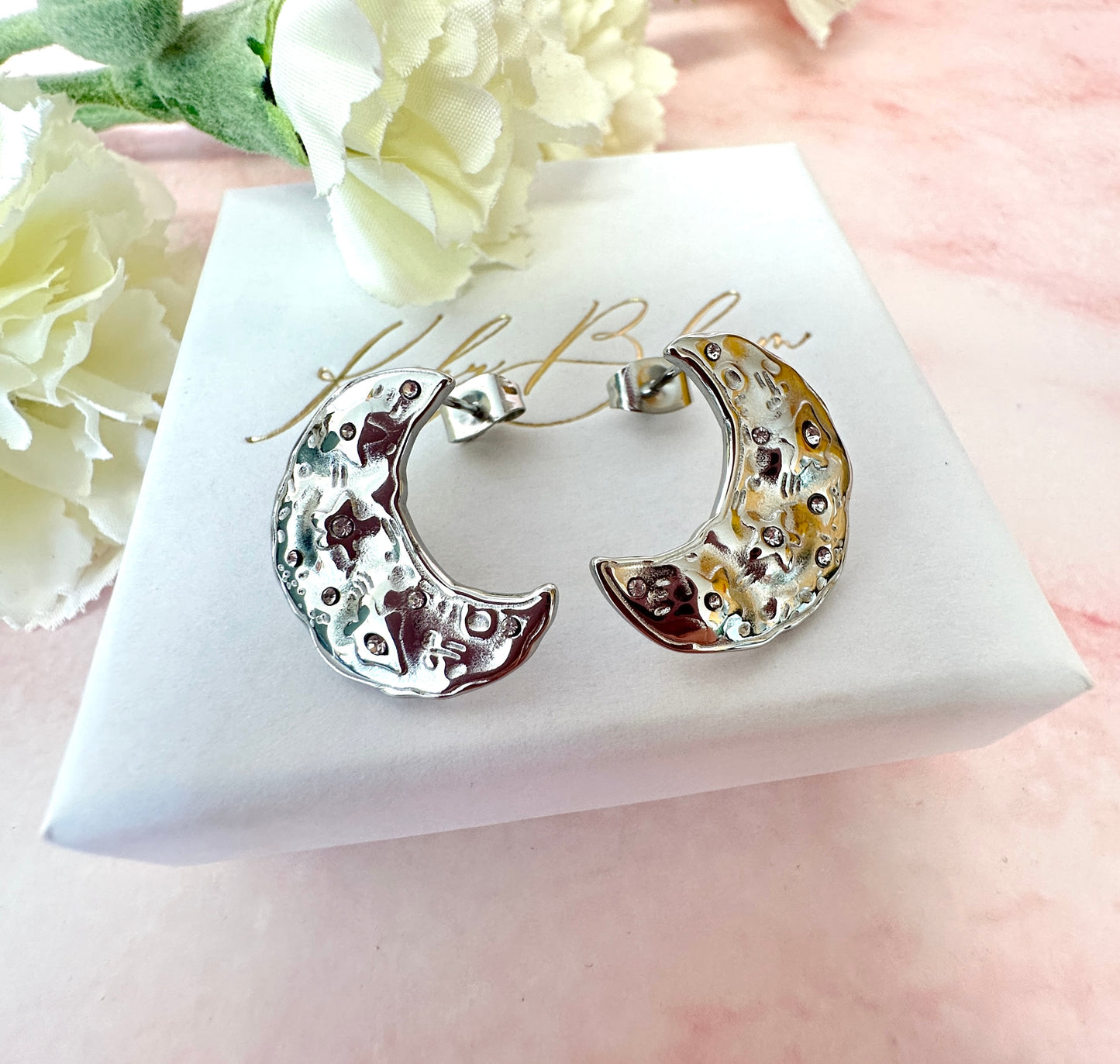 Silver oversized organic CZ Moon stud earrings .