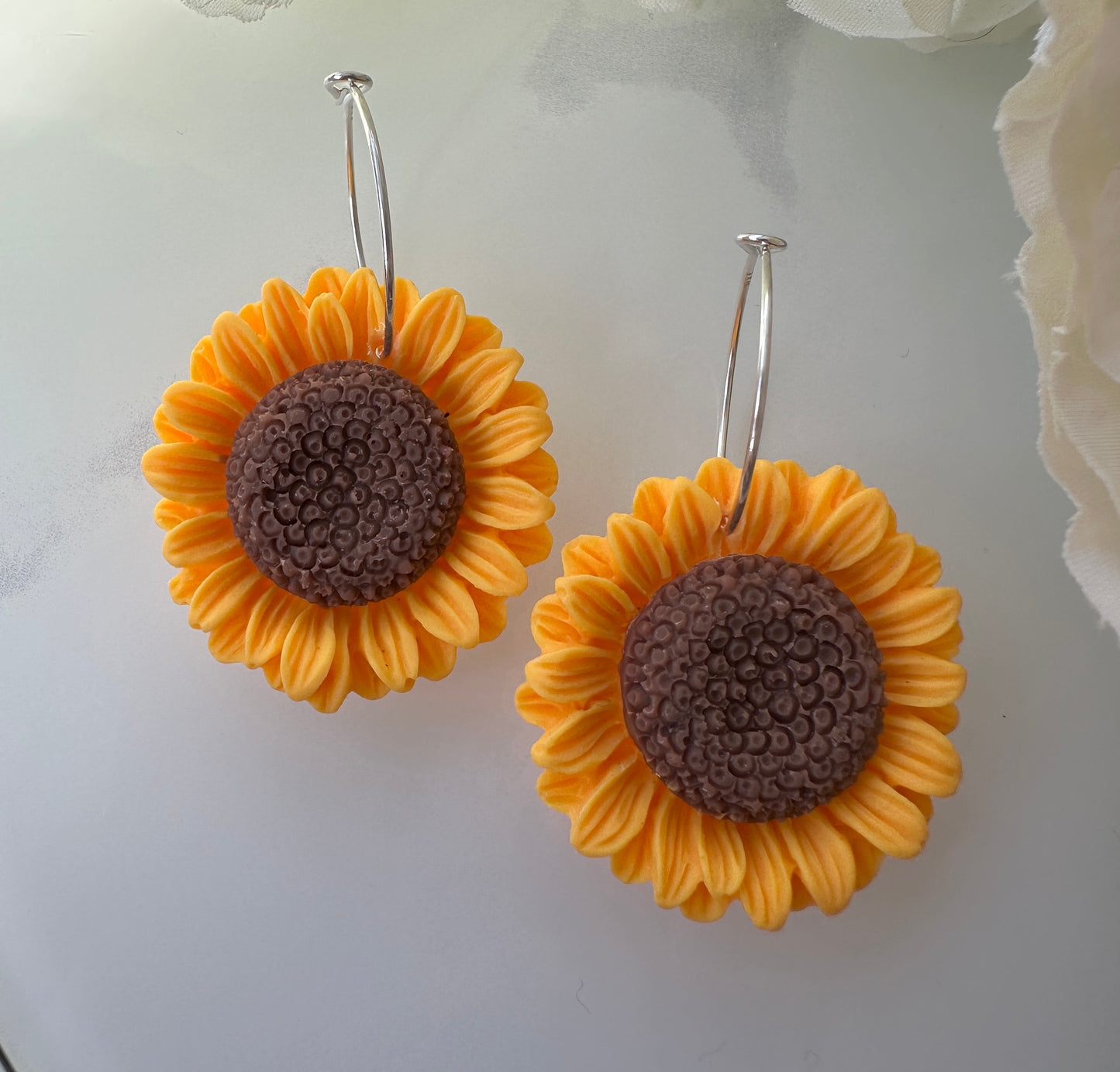 Sunflower 925 sterling hoop earrings.