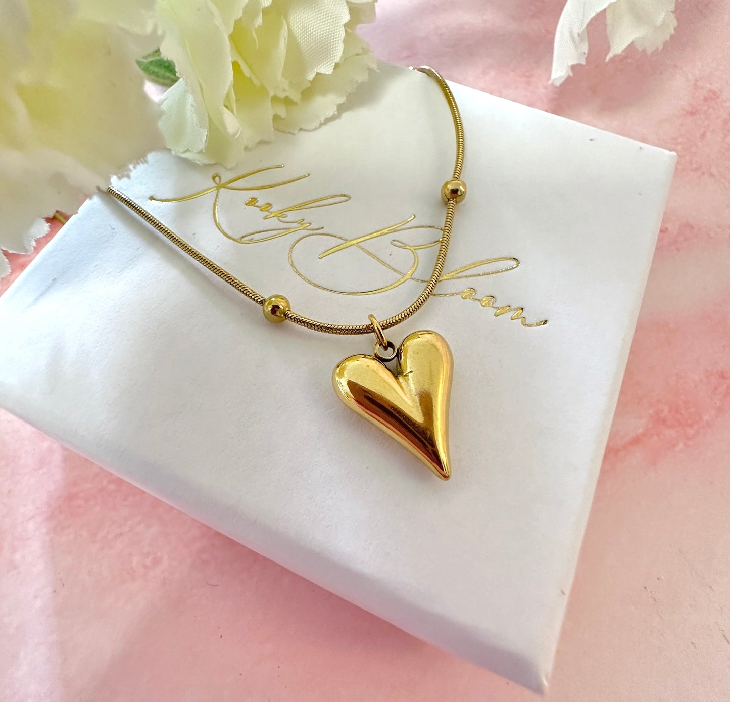 Gold Heart snake chain necklace.