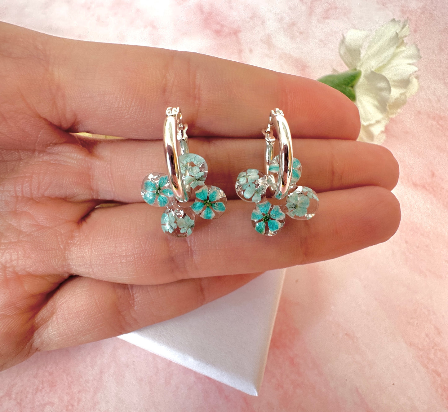 Tiny ice Blue Bloom flower Clover hoop earrings.