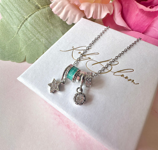 Silver Aqua Star cz Charm cluster necklace.