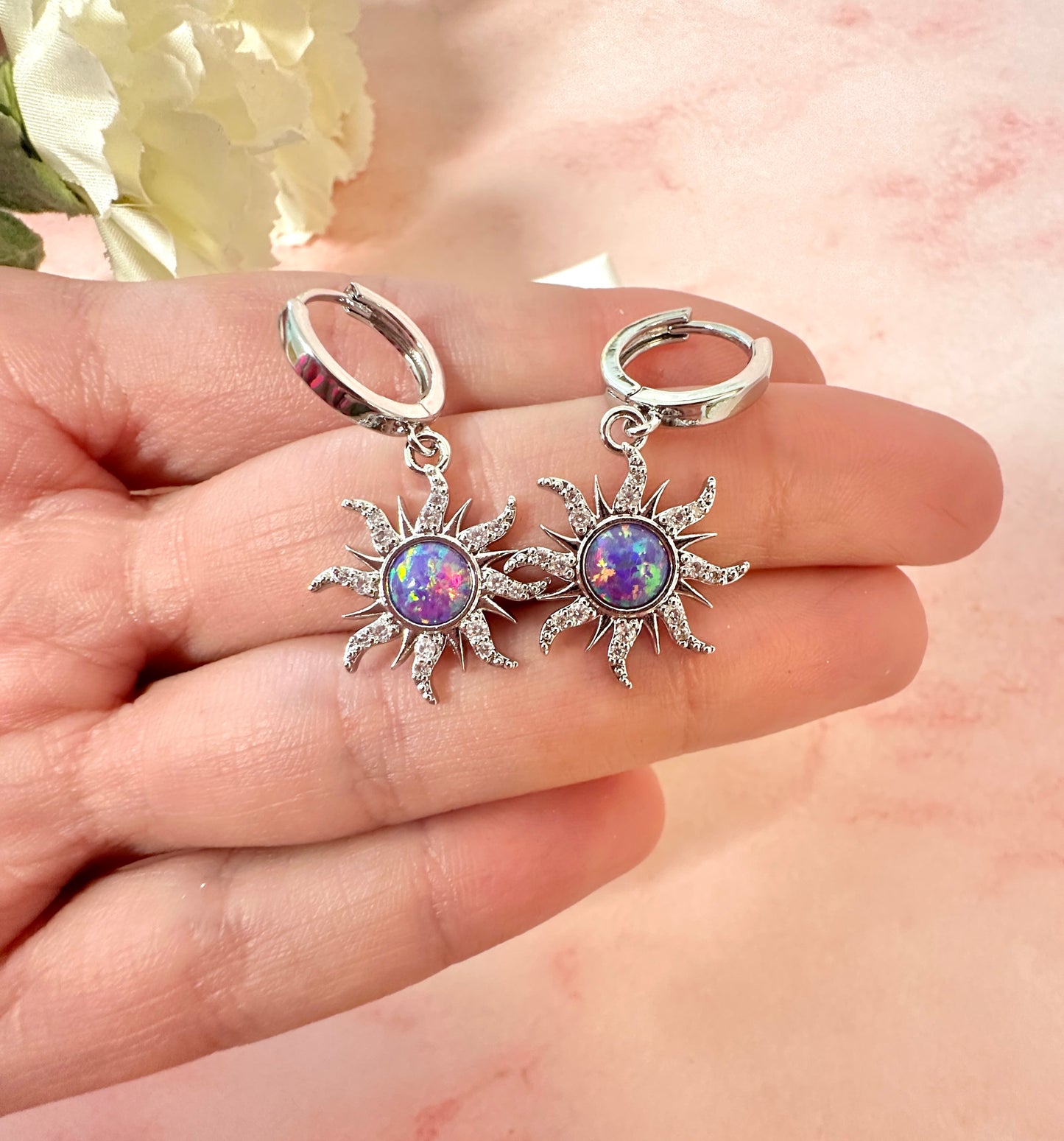 Silver Purple Opal Sun Huggie hoop earrings.