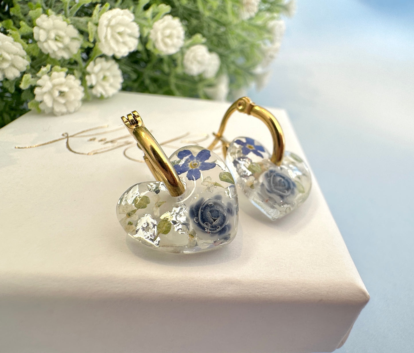 Mini Powder Blue Forget me not heart hoop earrings.
