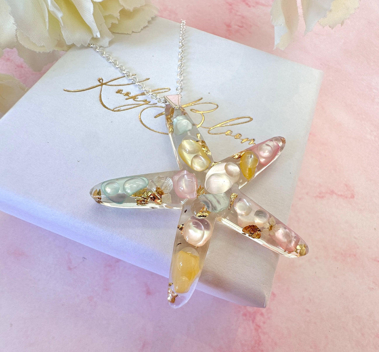 Silver Starfish seashell necklace.