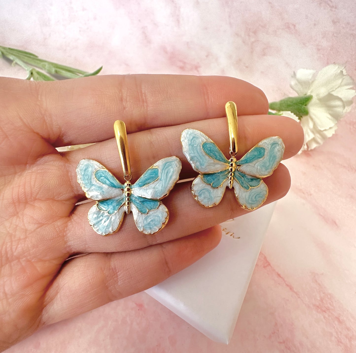 Gold Blue butterfly drop stud earrings .