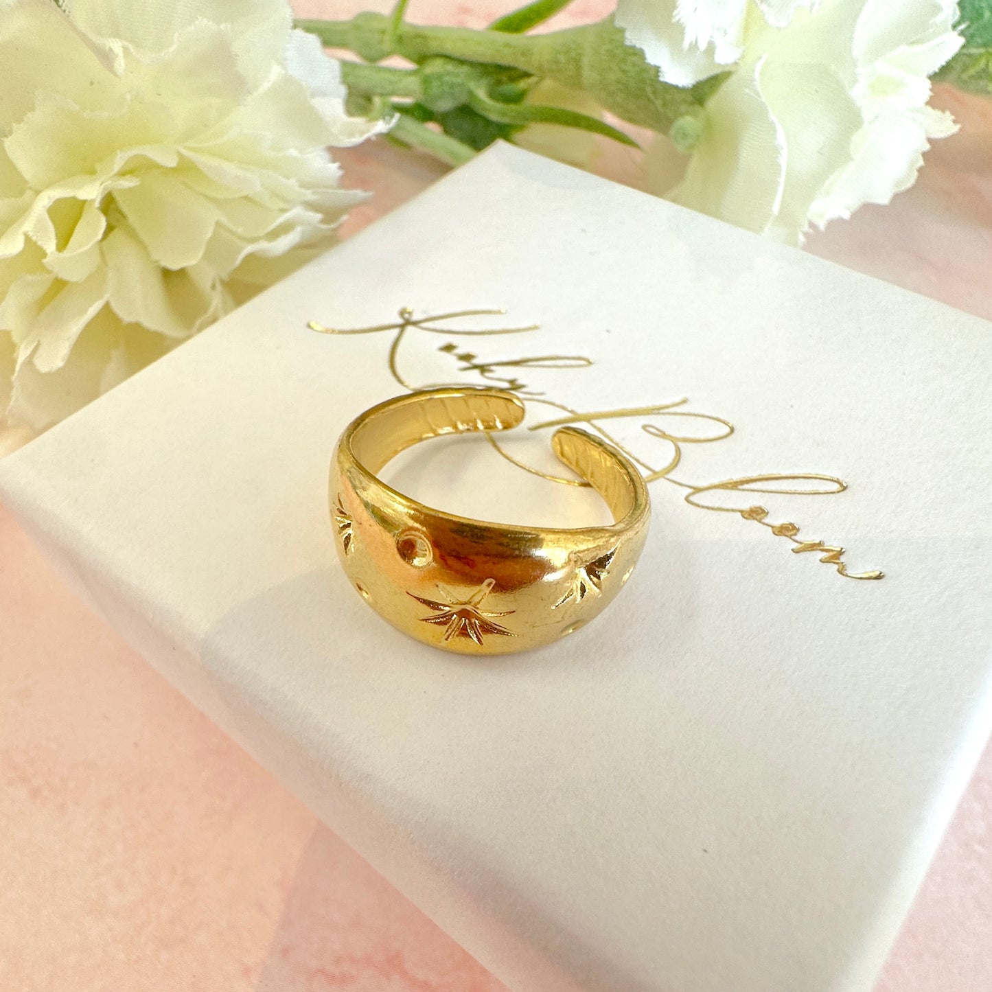 Gold domed celestial ring.
