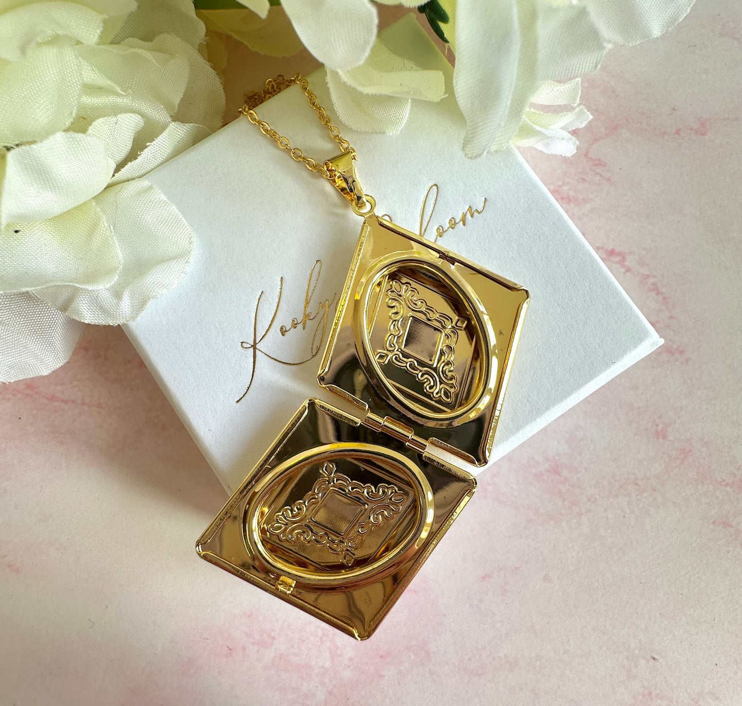 Gold Rhombus Locket necklace.