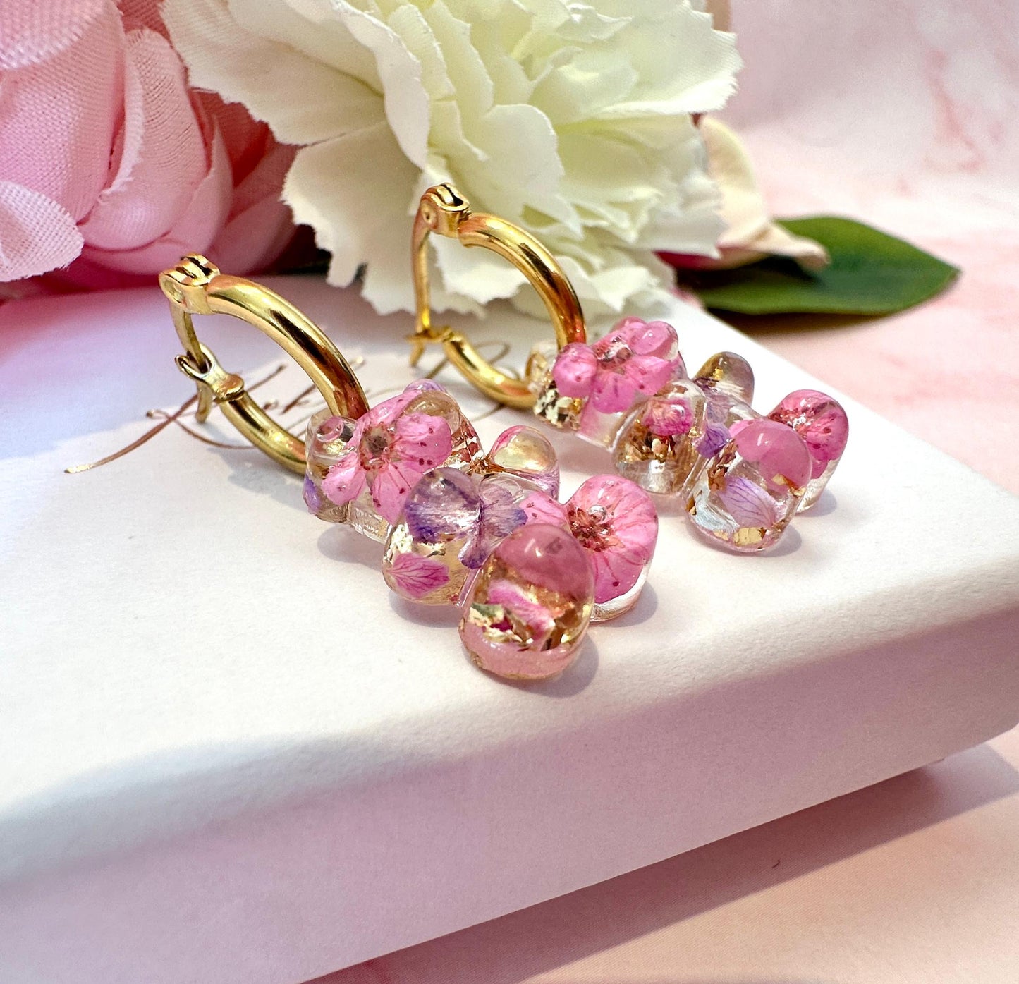 Gummy Bloom Bear hoop earrings.