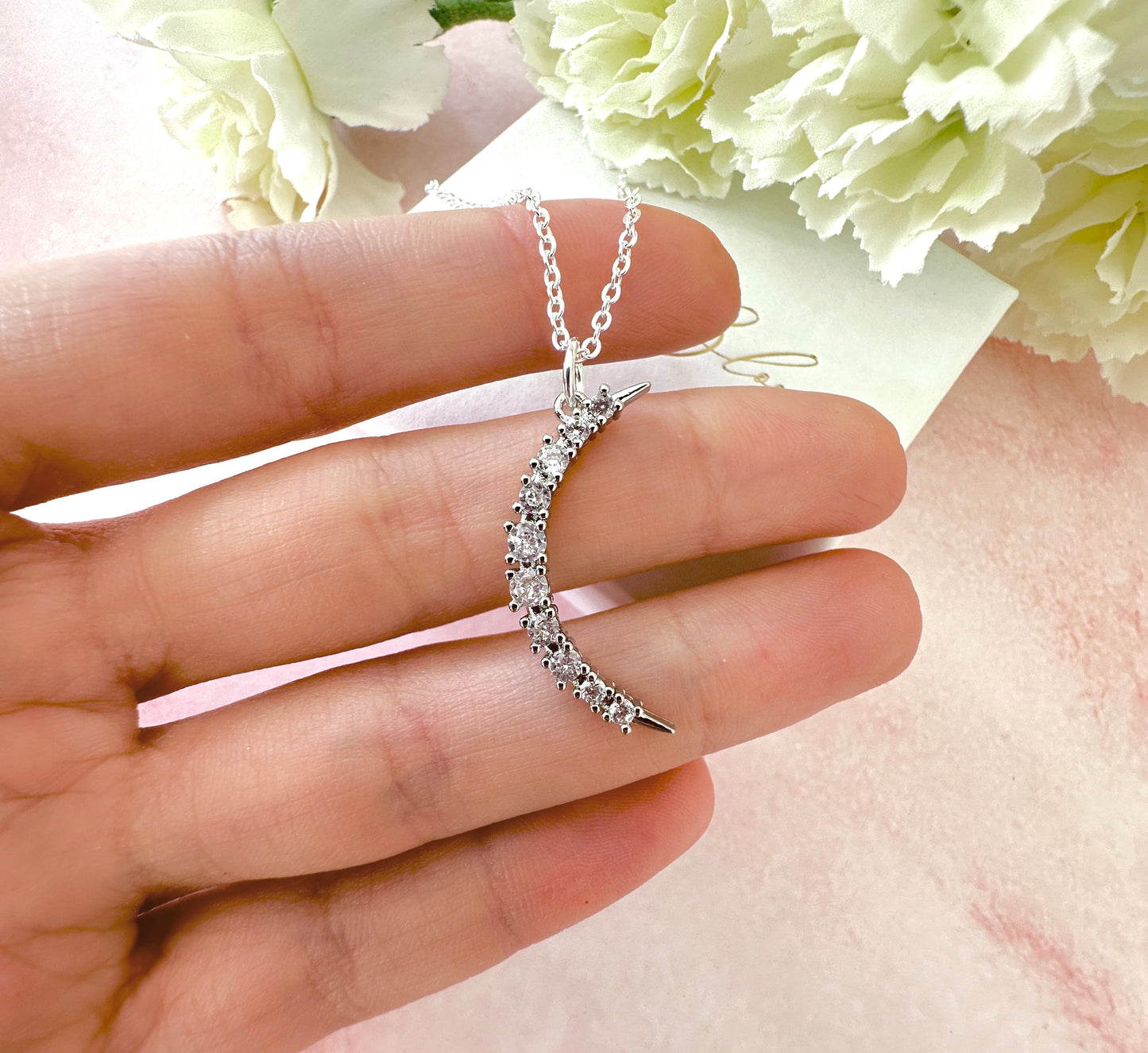 Silver cz Long Moon necklace.
