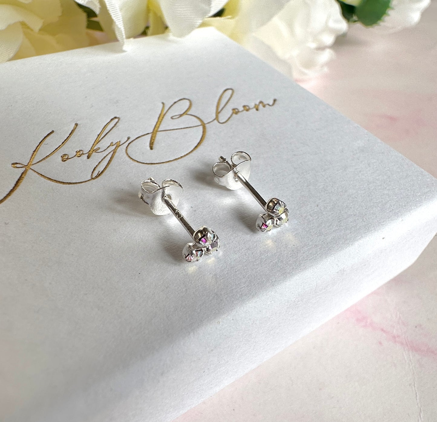 925 sterling silver AB CZ Tri Stone stud earrings.