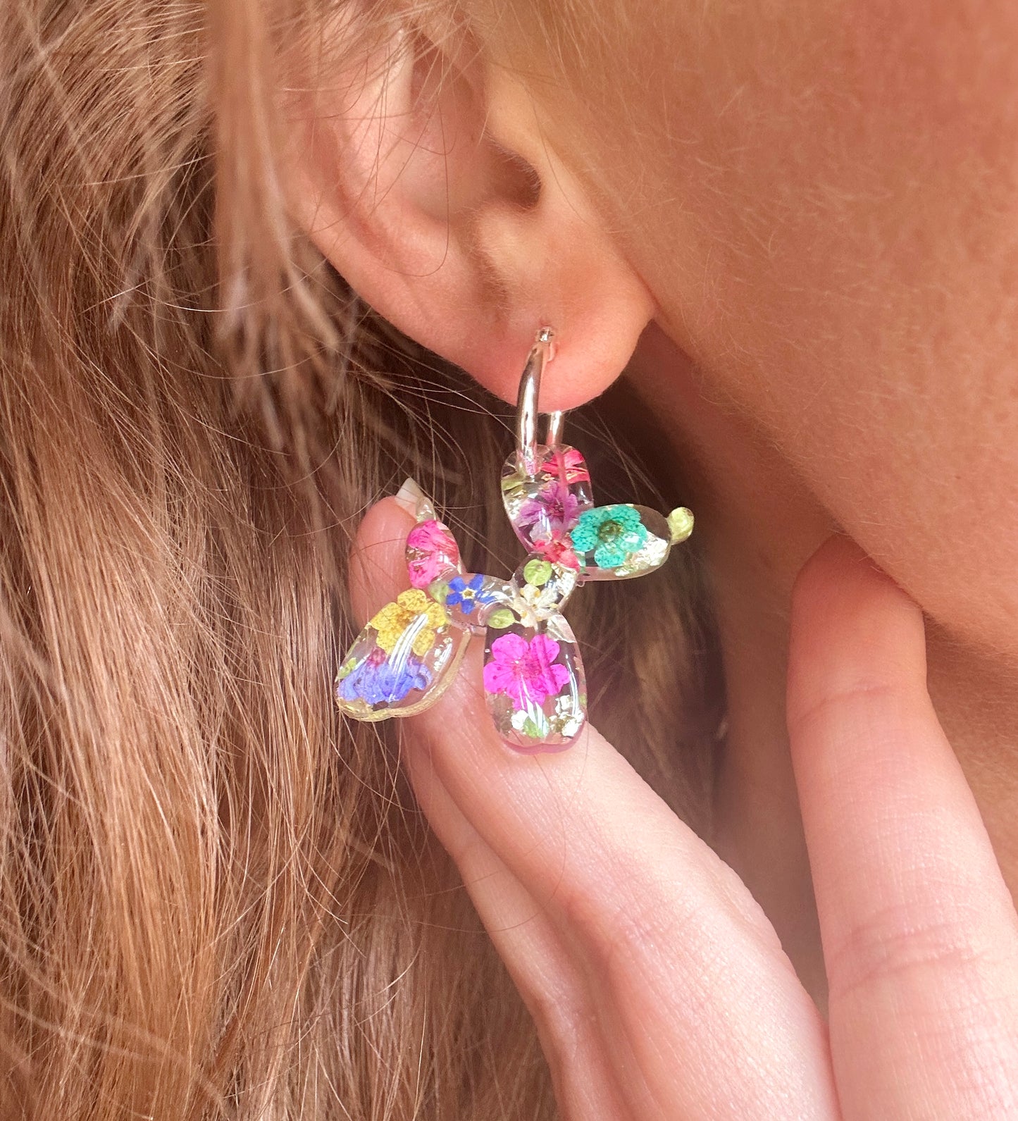 Balloon Dog bloom hoop earrings.