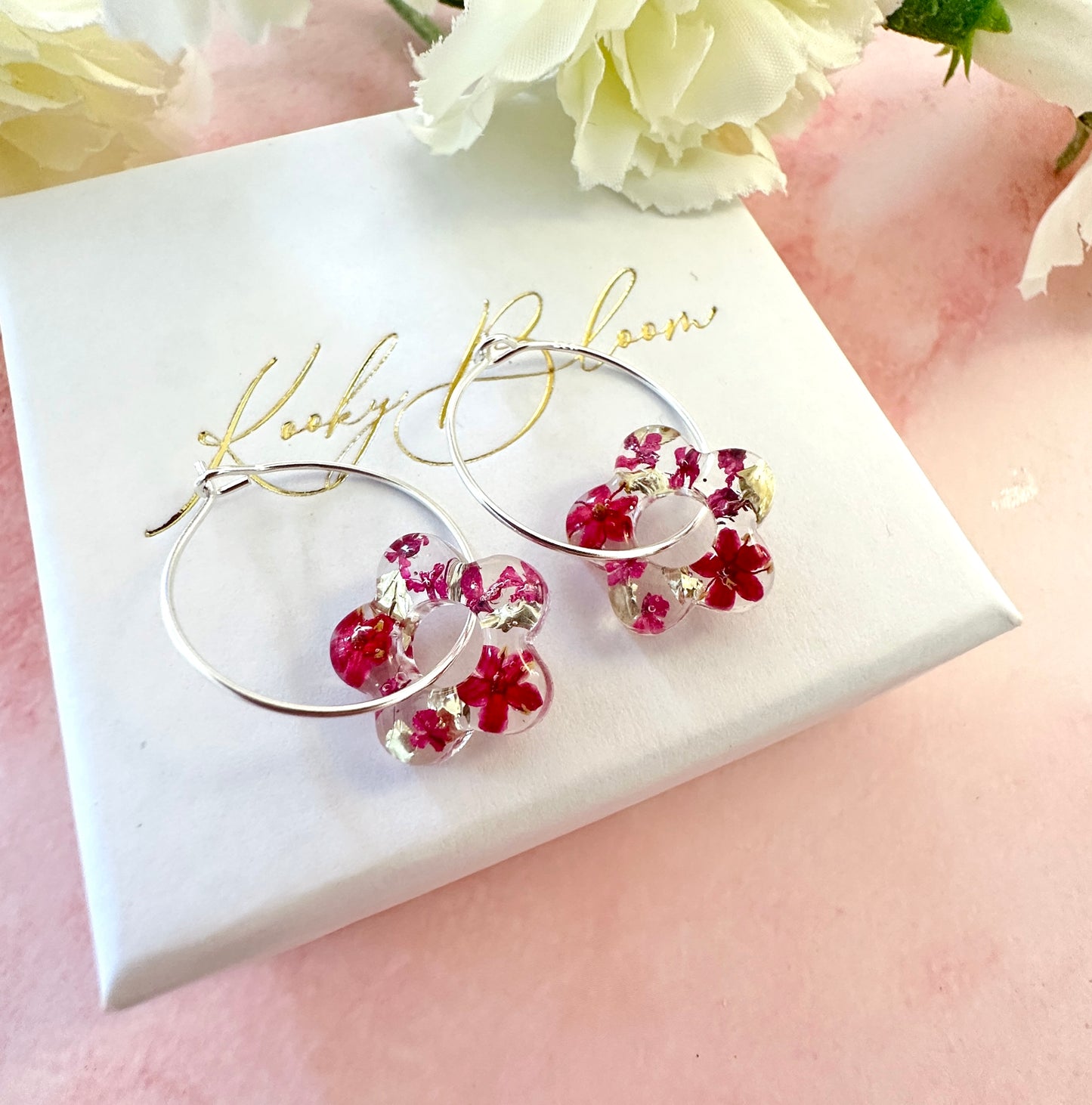 Tiny Dark Pink bloom flower earrings.