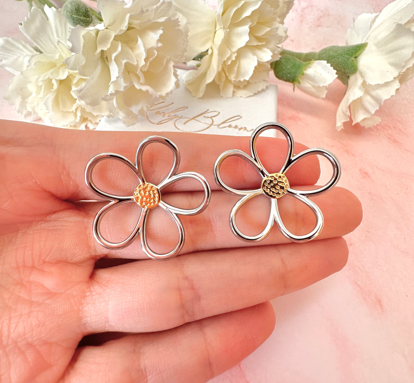 Oversized Hollow Flower silver stud earrings.