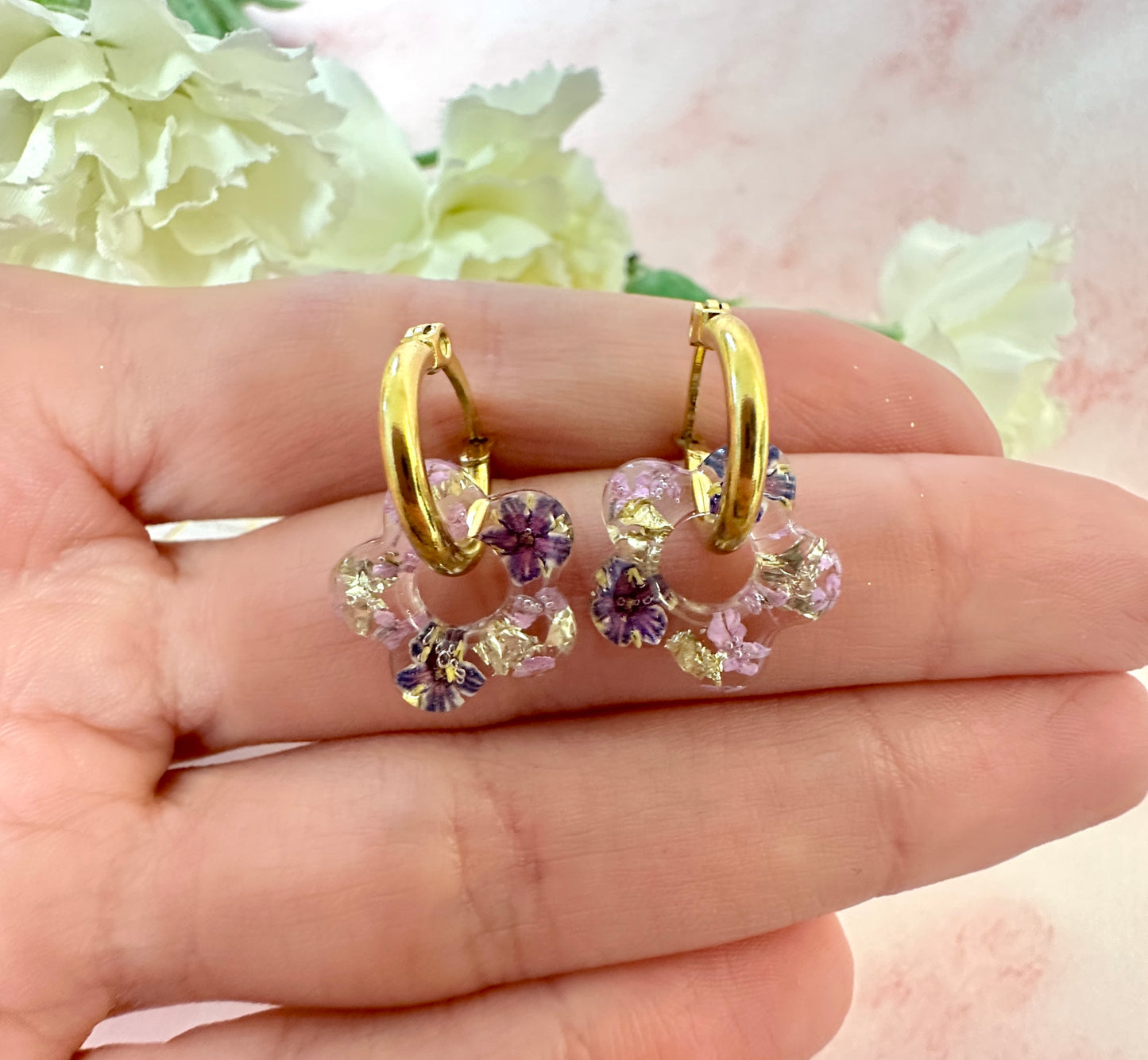 Tiny Purple bloom flower earrings.