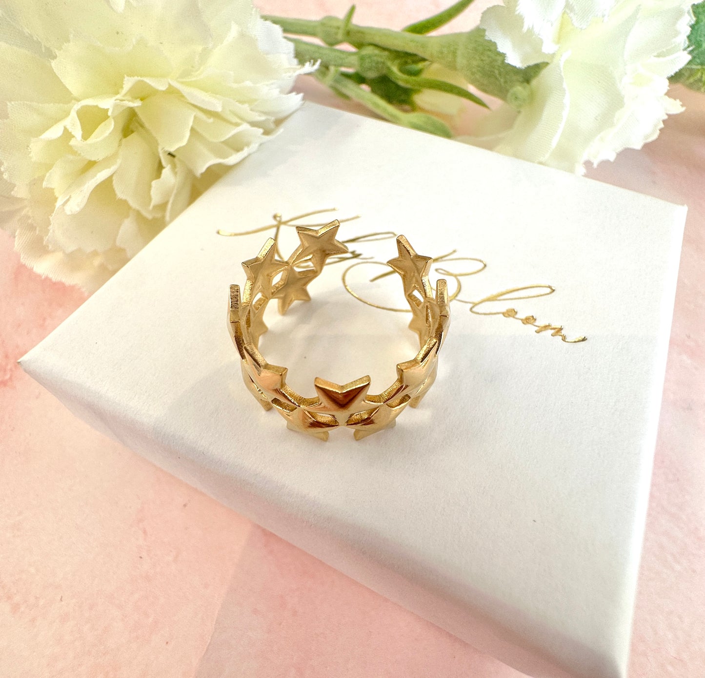 Gold adjustable Star cluster ring.