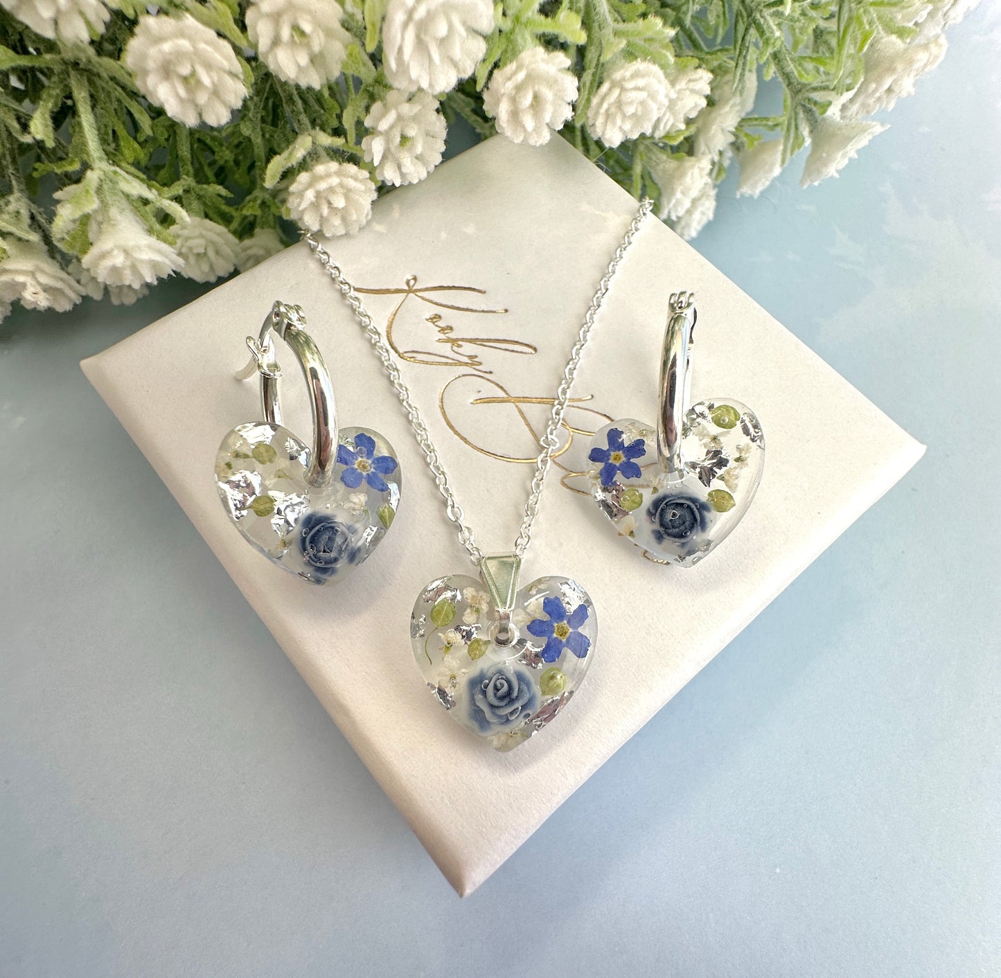 Mini Powder Blue Forget me not heart hoop earrings.