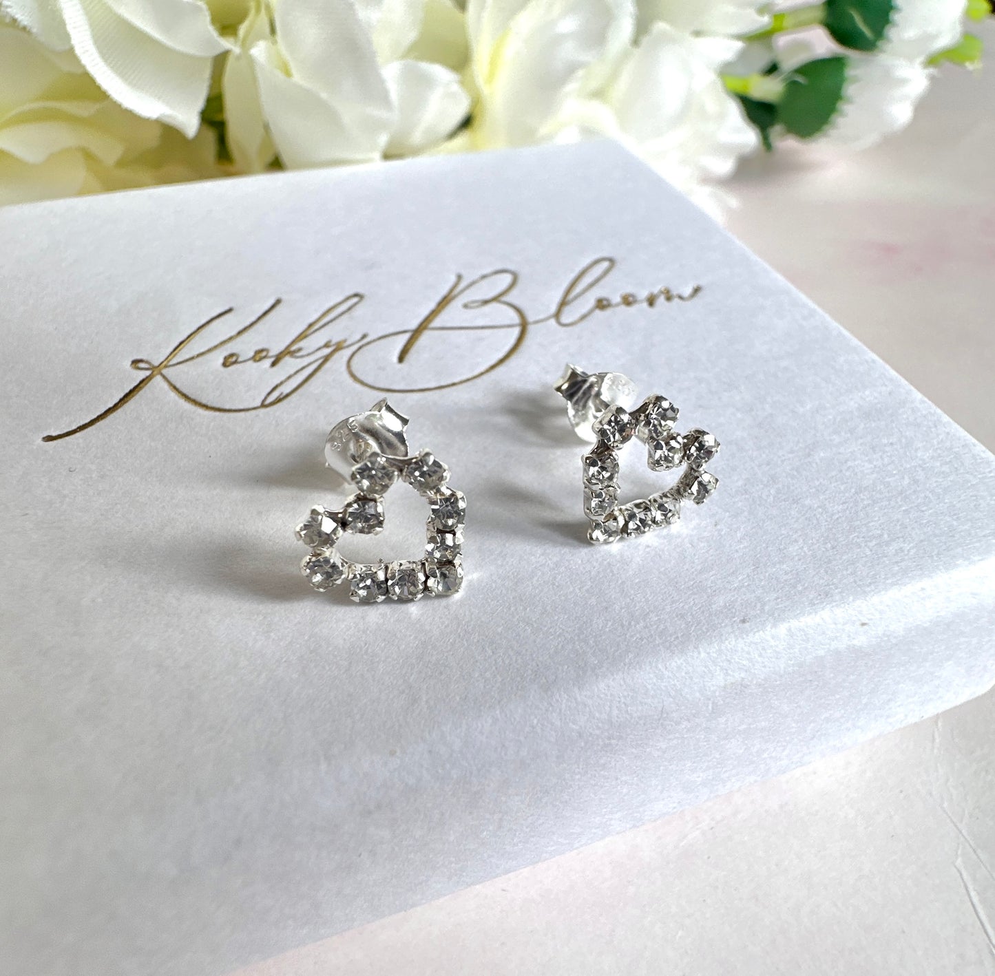 925 sterling silver CZ Hollow heart stud earrings.