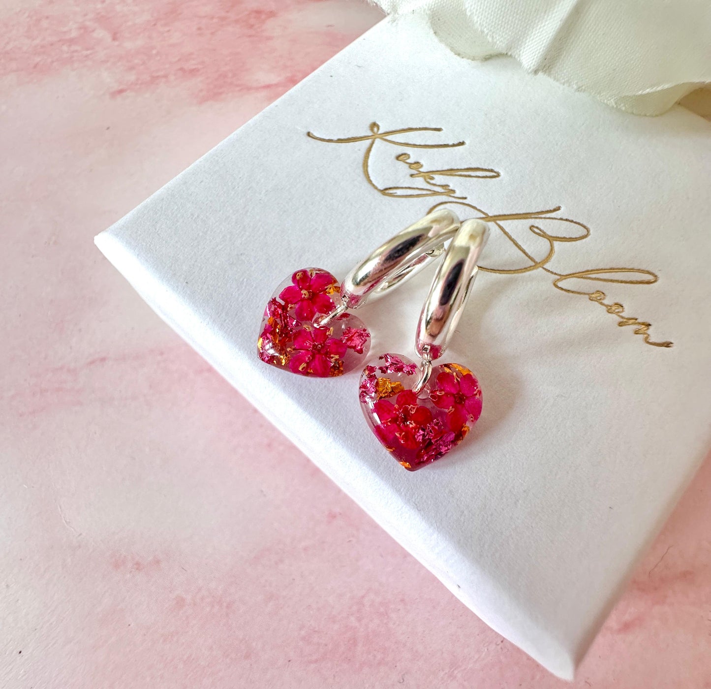 Silver Tiny Fuchsia pink bloom heart Huggies earrings.
