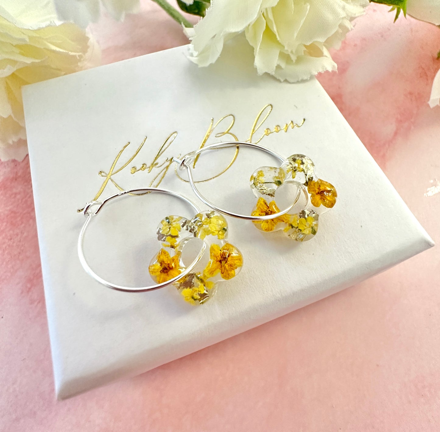 Tiny Yellow bloom flower earrings.