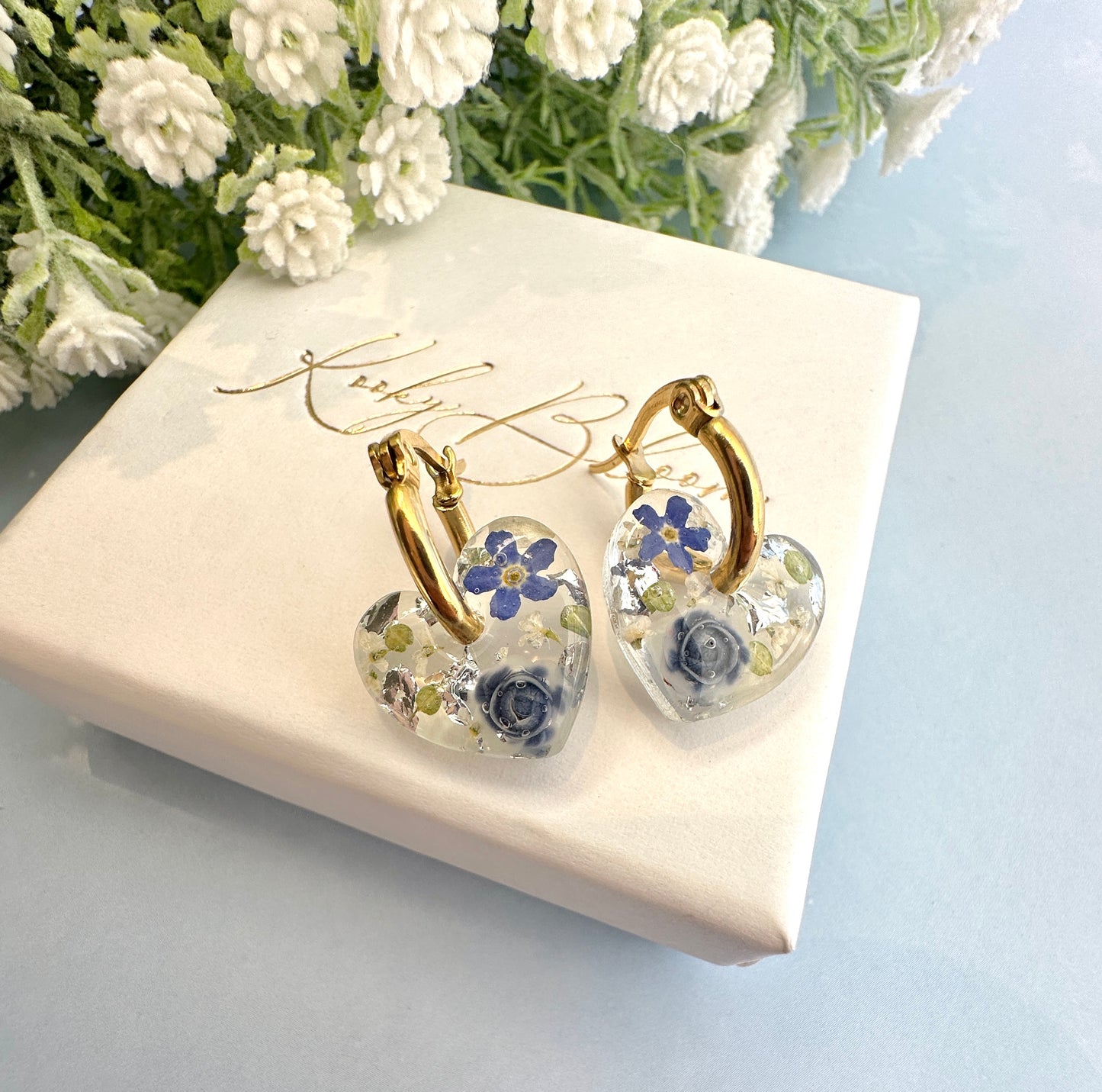 Mini Powder Blue Forget me not heart hoop earrings.