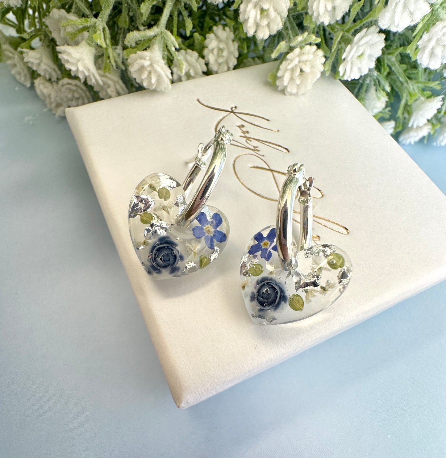 Mini Powder Blue Forget me not heart hoop earrings.