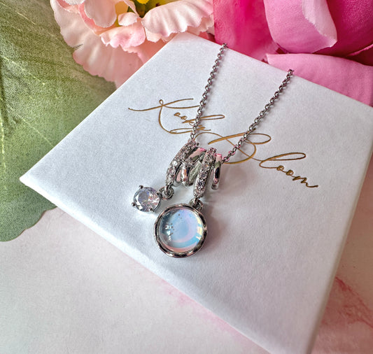 Silver Opalescent Cz Cluster charm necklace.