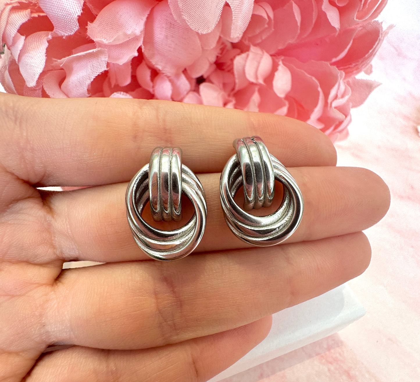 Silver Loop chunky stud earrings.