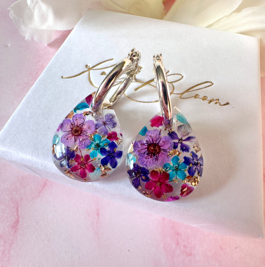 Purple Rain Bloom Teardrop hoop earrings.