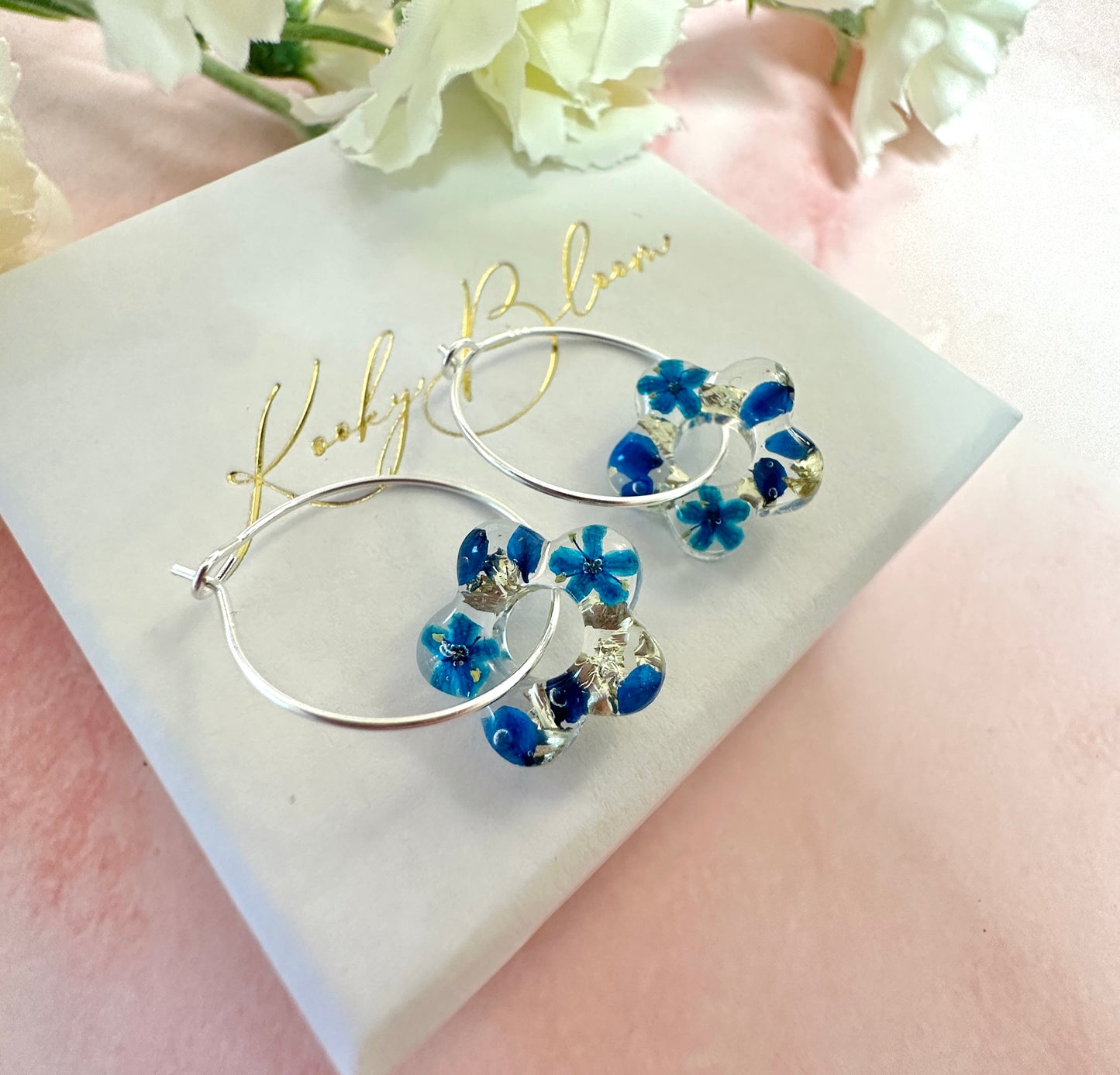Tiny Blue bloom flower earrings.