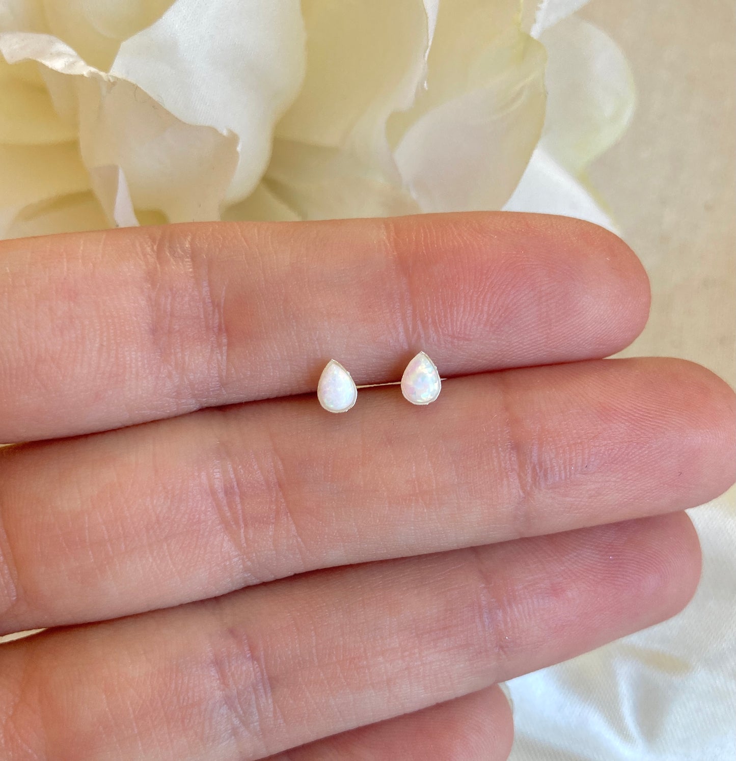 925 sterling Tiny Opal Teardrop stud earrings.