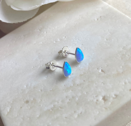 925 sterling silver Blue Opal teardrop stud earrings.