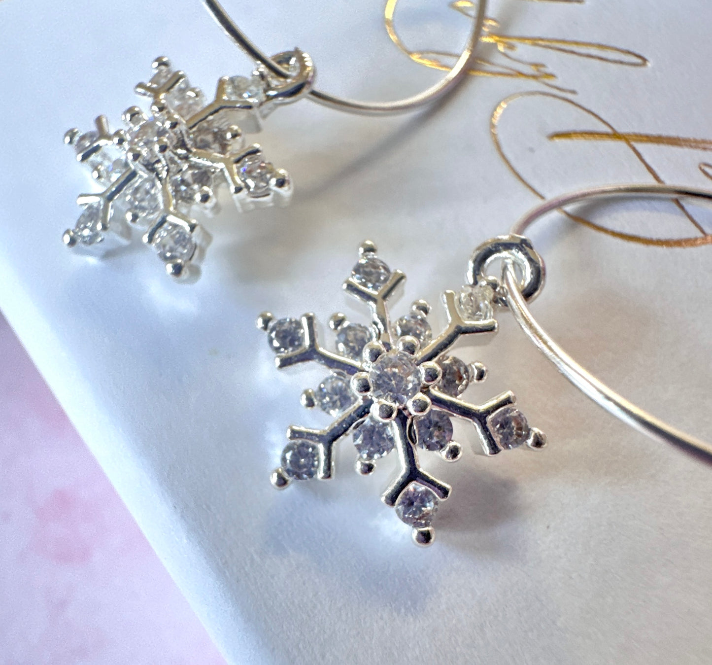Silver CZ snowflake 925 Sterling hoop earrings.
