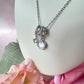 Silver Opalescent Cz Cluster charm necklace.