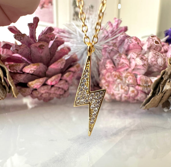 Gold CZ Lightning Bolt necklace.