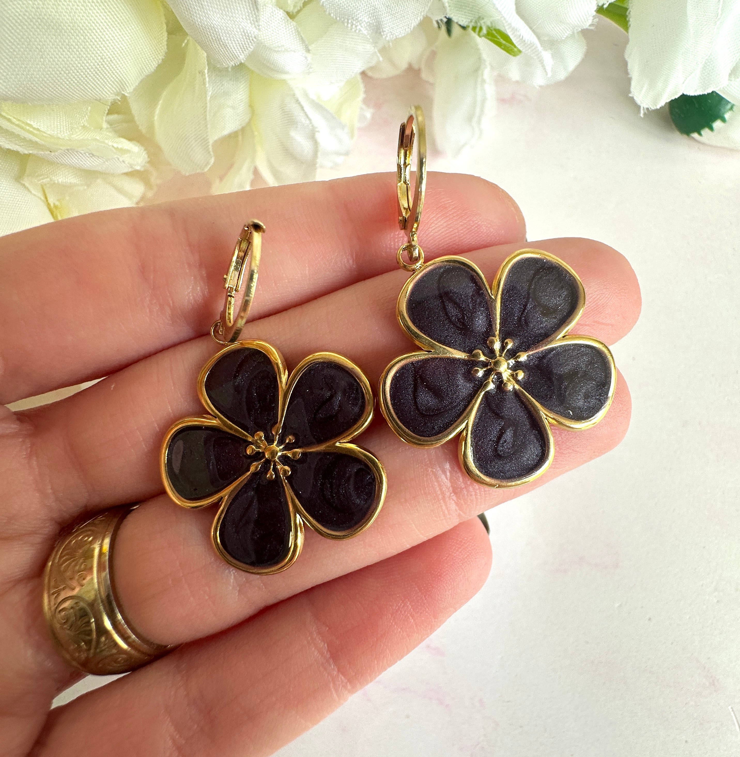 Gold black Flower huggie earrings.