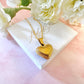 Gold puff heart Necklace.